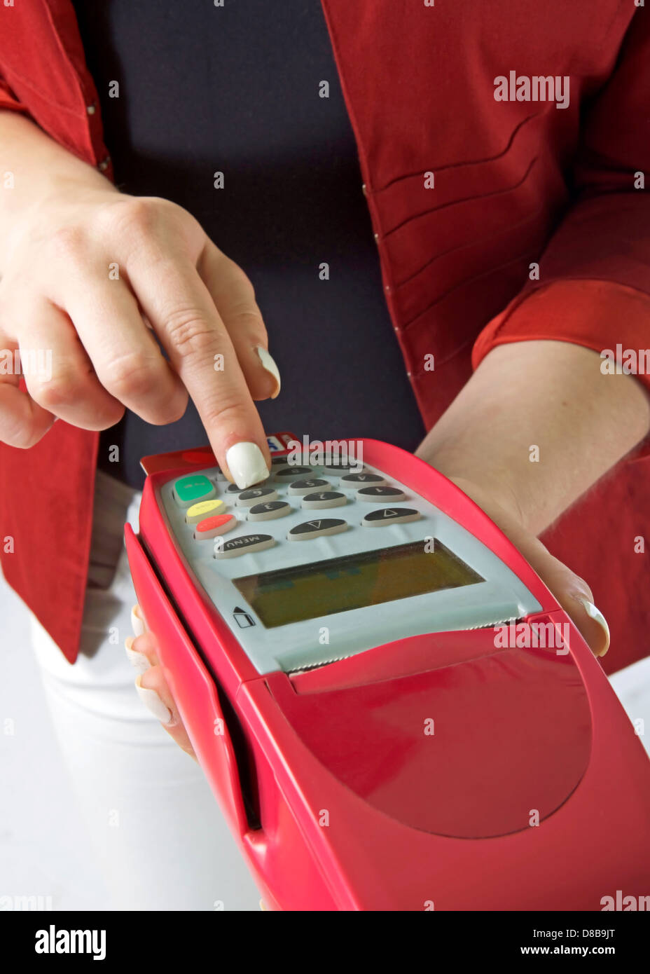 Woman working with a visa machine Stock Photo