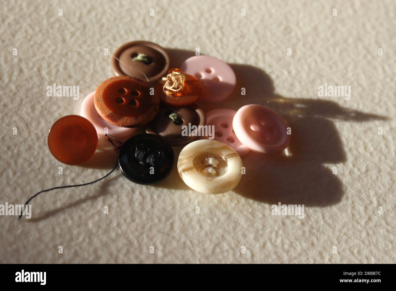 Various types of buttons of different sizes and colors. These buttons ...