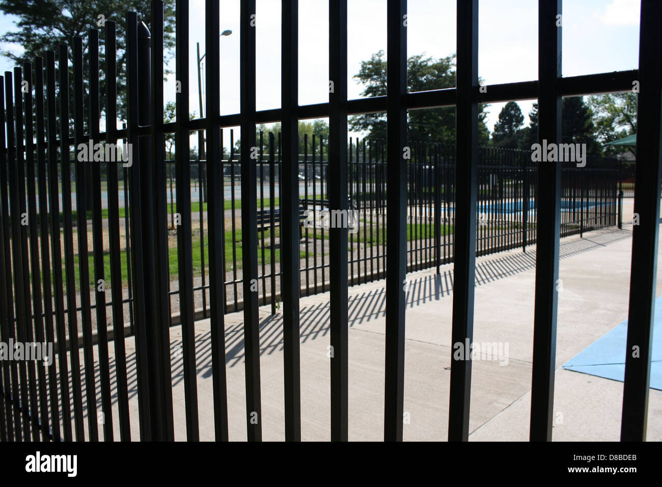 This image shows a fenced area, typically used to enclose property or ...