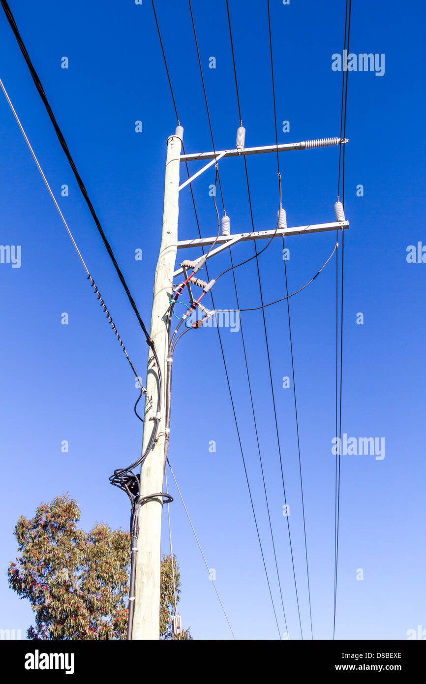 Three phase overhead electrical distribution poles and cables, Sunbury, Victoria, Australia Stock Photo