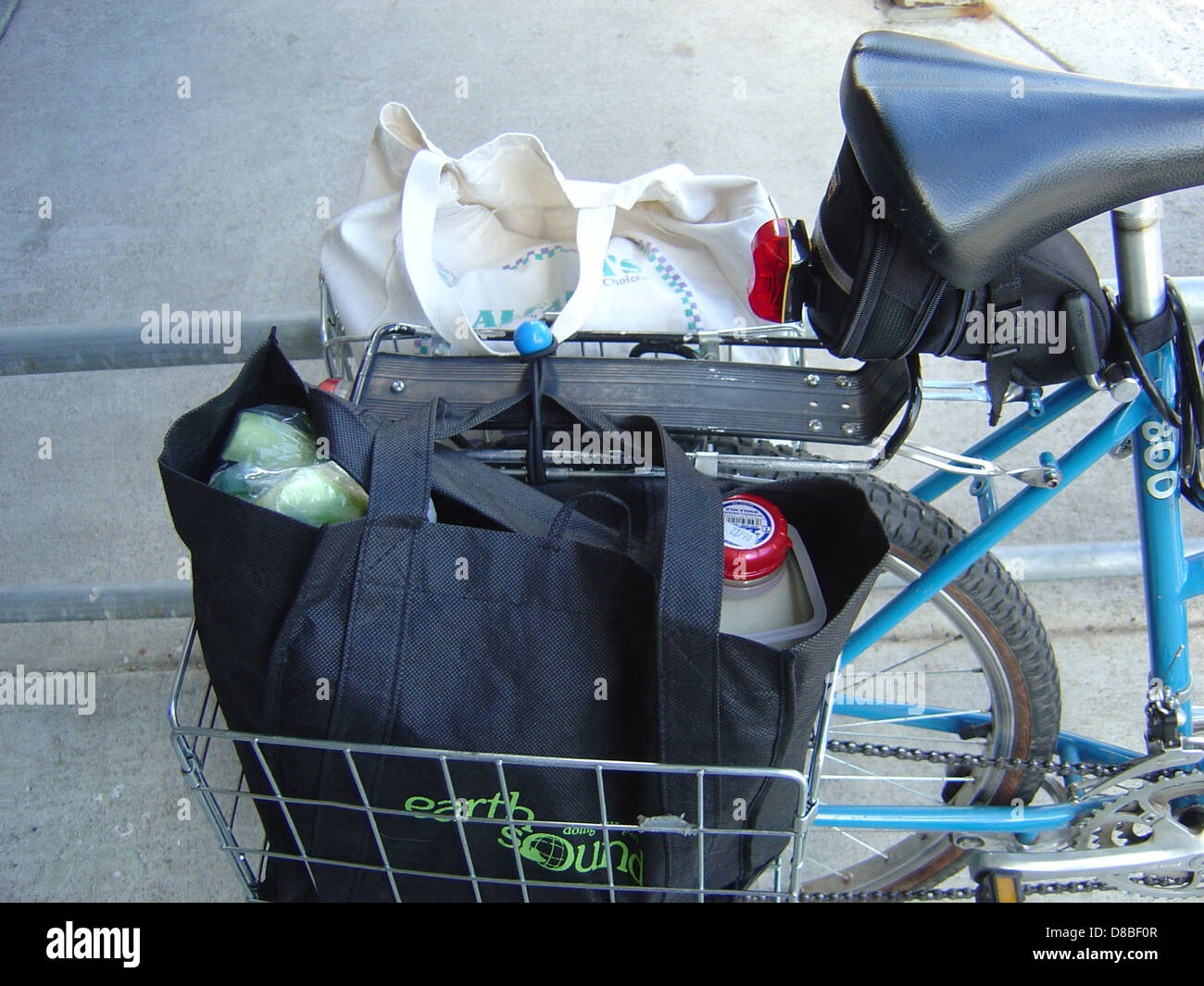 groceries in bike basket Stock Photo Alamy