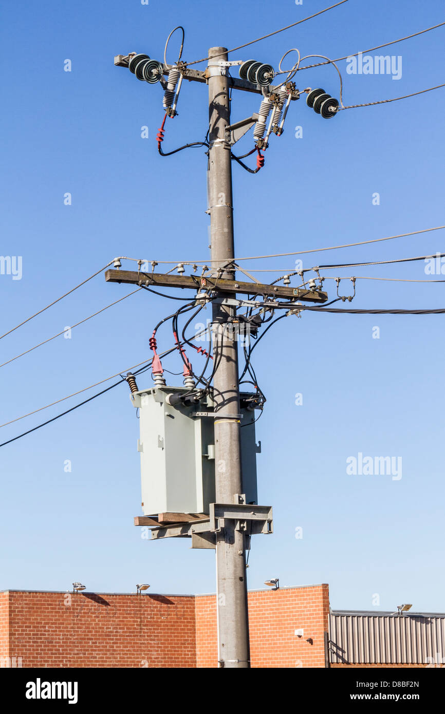 High tension three phase overhead electrical distribution poles and cables, Sunbury, Victoria, Australia Stock Photo