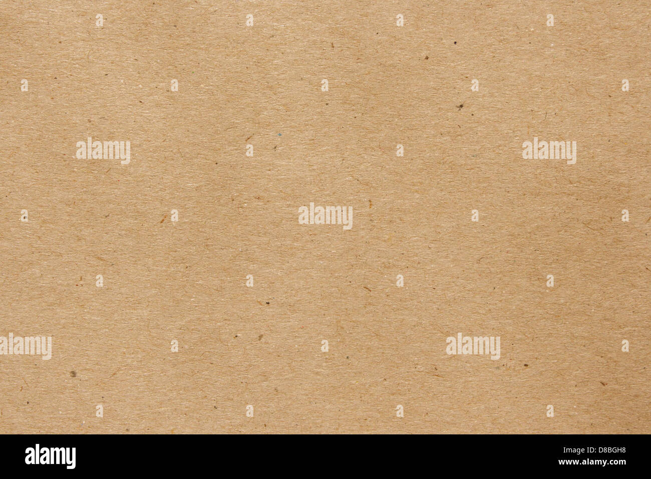 Tan Rough Paper A close-up of light brown tan paper with visible flecks, showcasing the ...