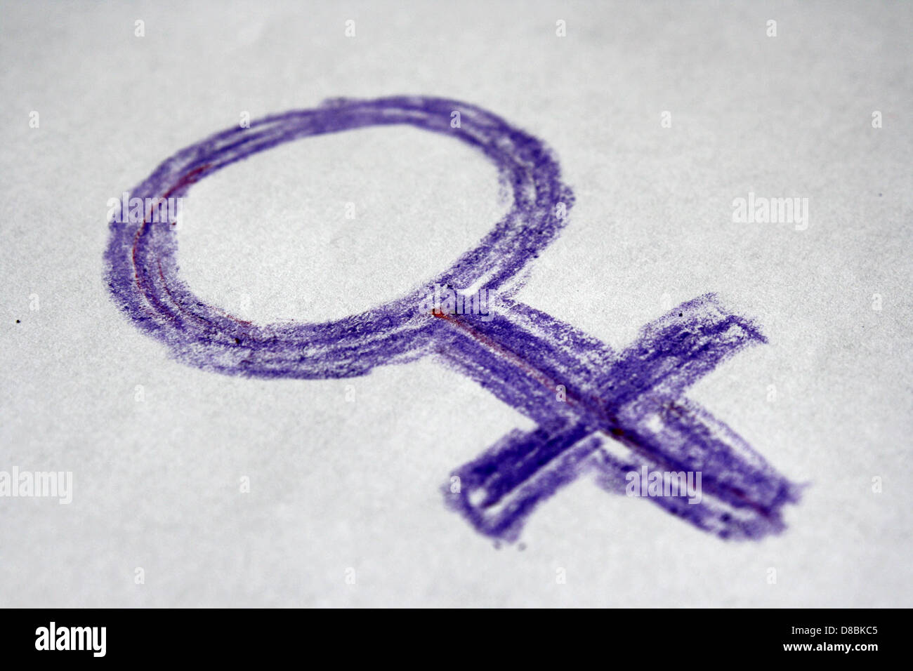 purple crayon drawn female gender sign or symbol Stock Photo Alamy
