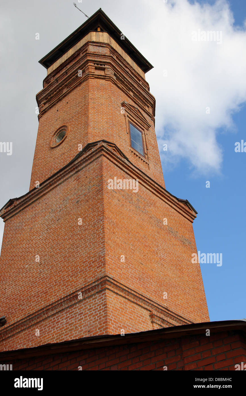 old fire tower on a background of blue sky Stock Photo Alamy