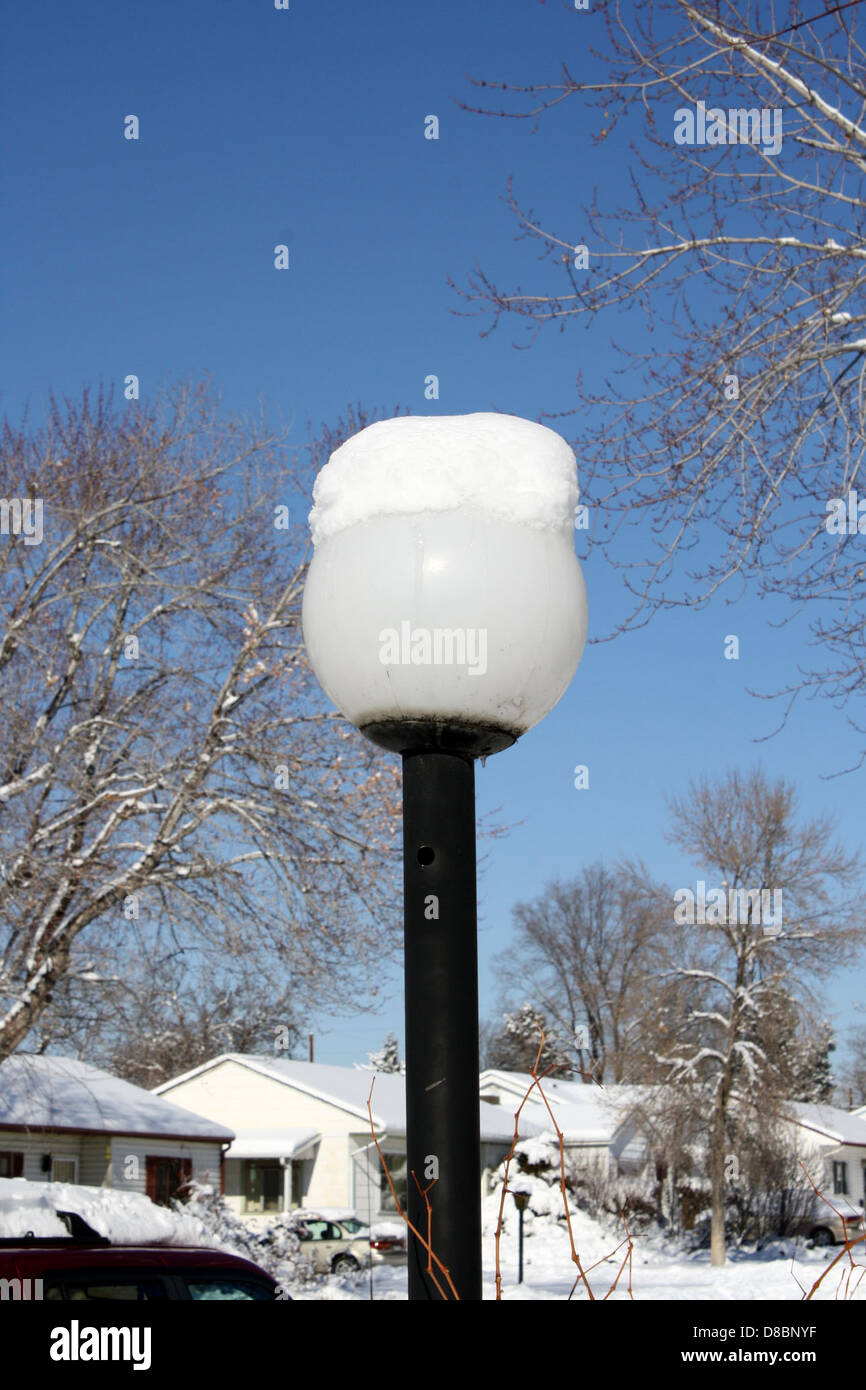 snow on outdoor street lamp Stock Photo - Alamy