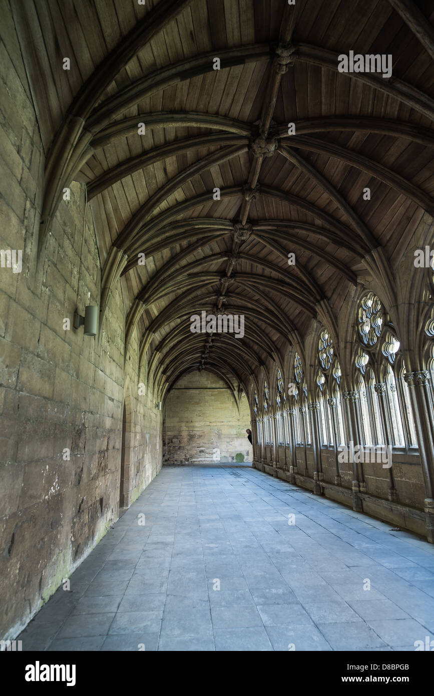Peeping round a corner of the cloister at Lincoln cathedral, England. Stock Photo