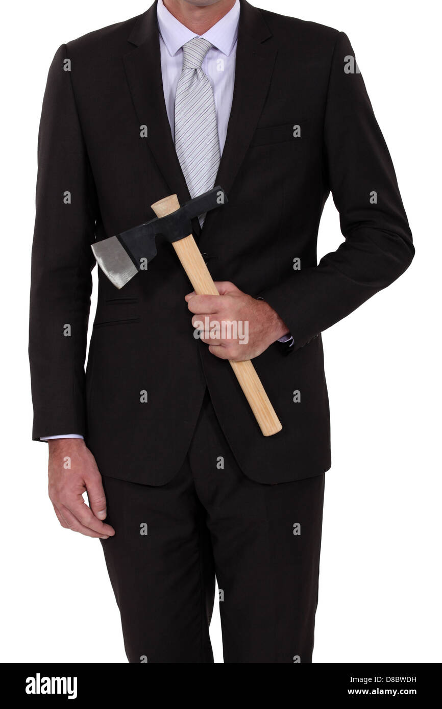 Businessman with an axe Stock Photo