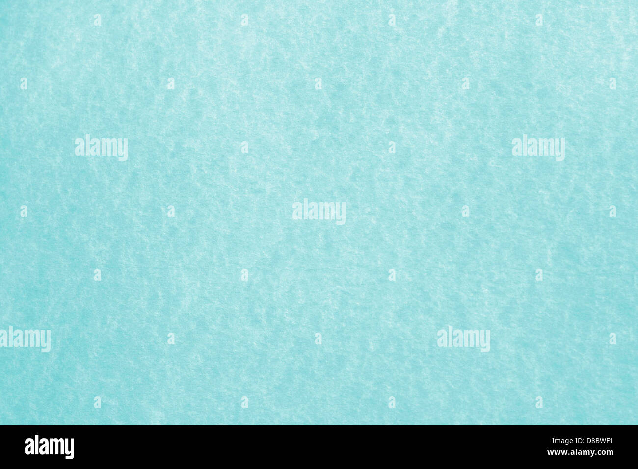 A close-up image of turquoise-colored parchment paper, highlighting its ...