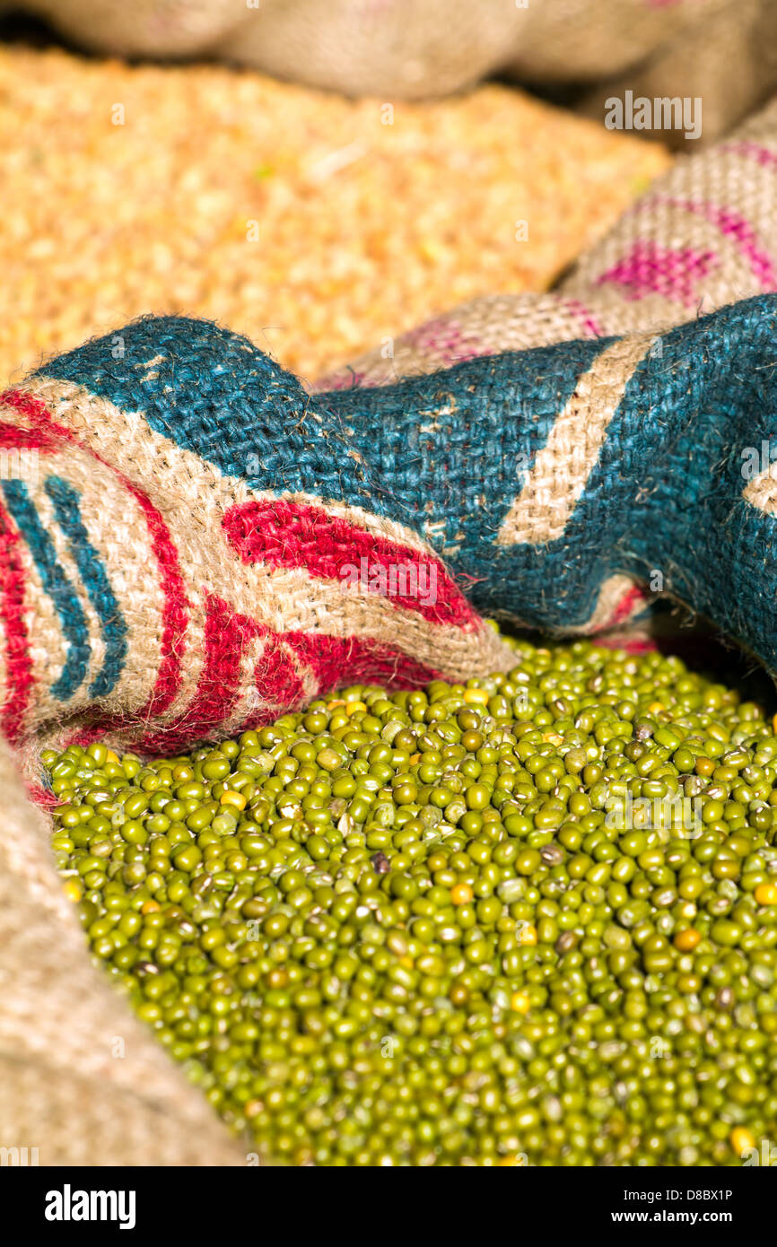 Green mung beans in canvas sack background Stock Photo