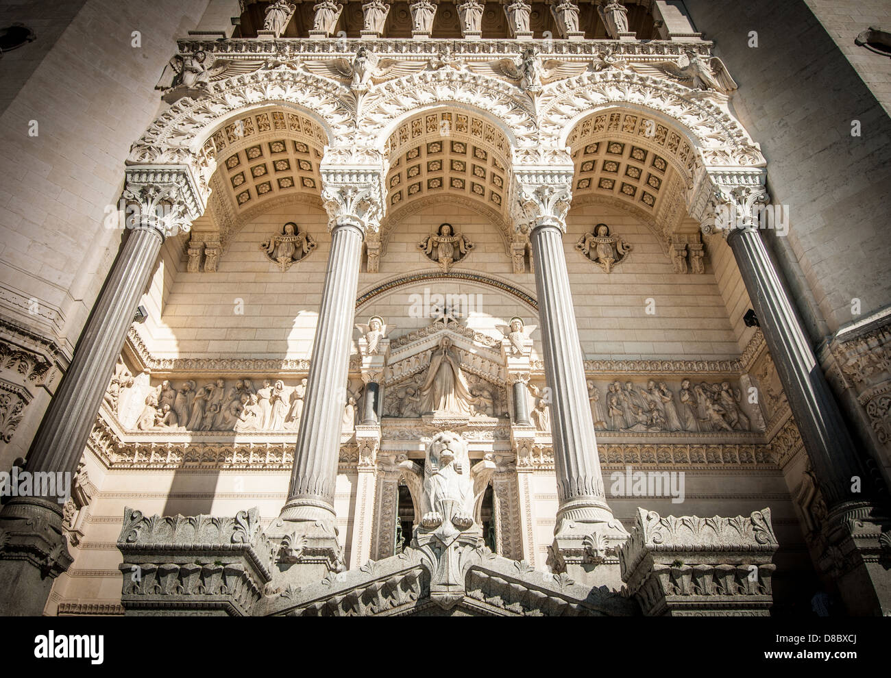 Entrance of basilica of Notre Dame de Fourviere, Lyon, France, Europe. Grand facade of historical building with high columns Stock Photo