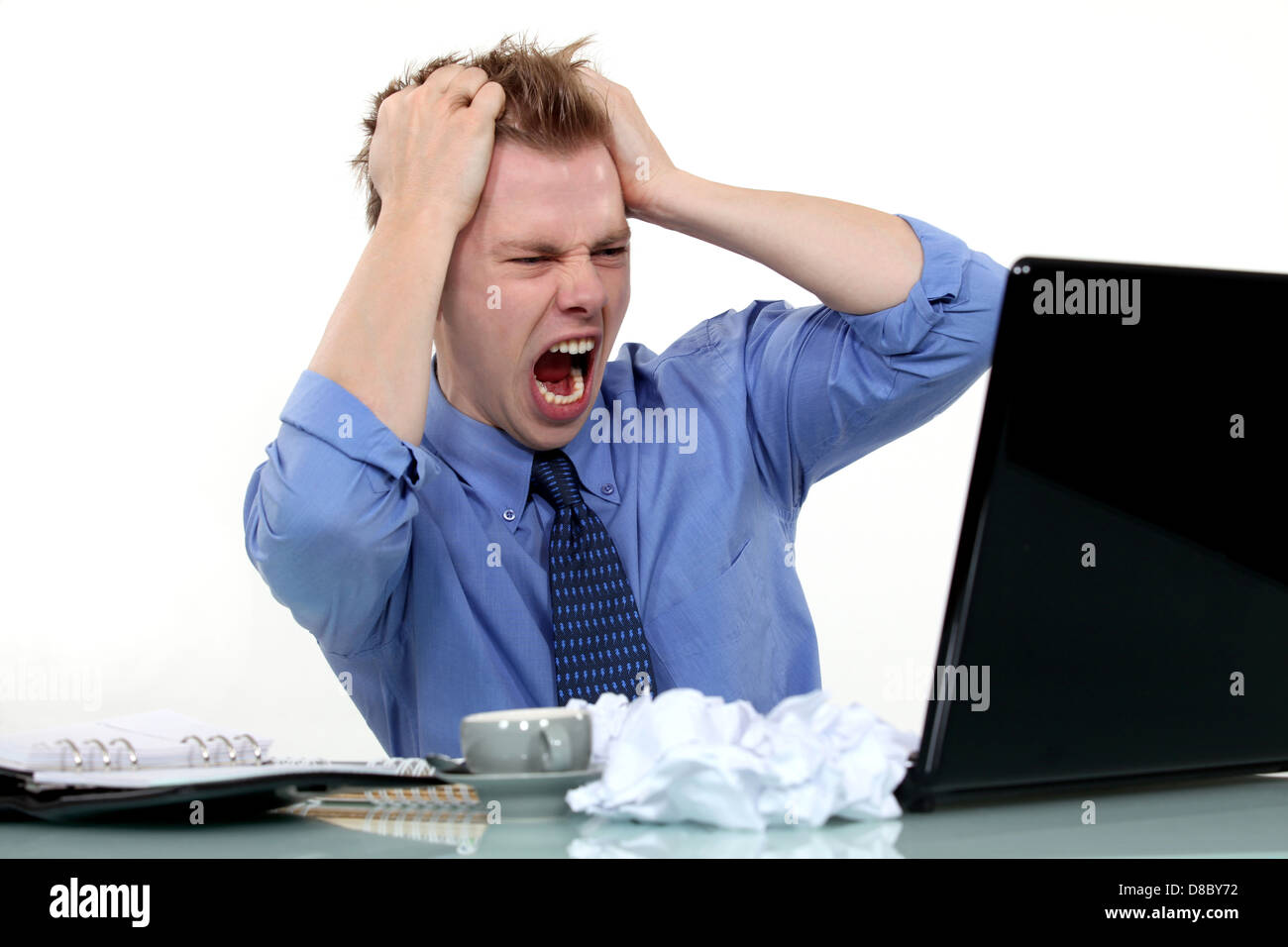 Frustrated man pulling his hair out Stock Photo Alamy