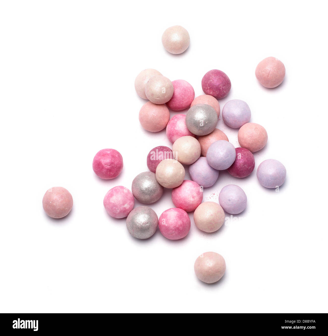 makeup powder balls cut out onto a white background Stock Photo - Alamy