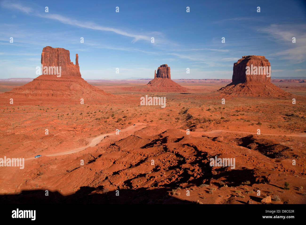 Monument Valley panorama taken from the Visitor Center showing the sandstone buttes 'Mittens' and the loop road , USA Stock Photo