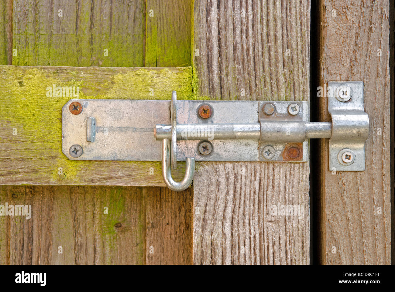 Weathered bolt on wooden gate Stock Photo Alamy