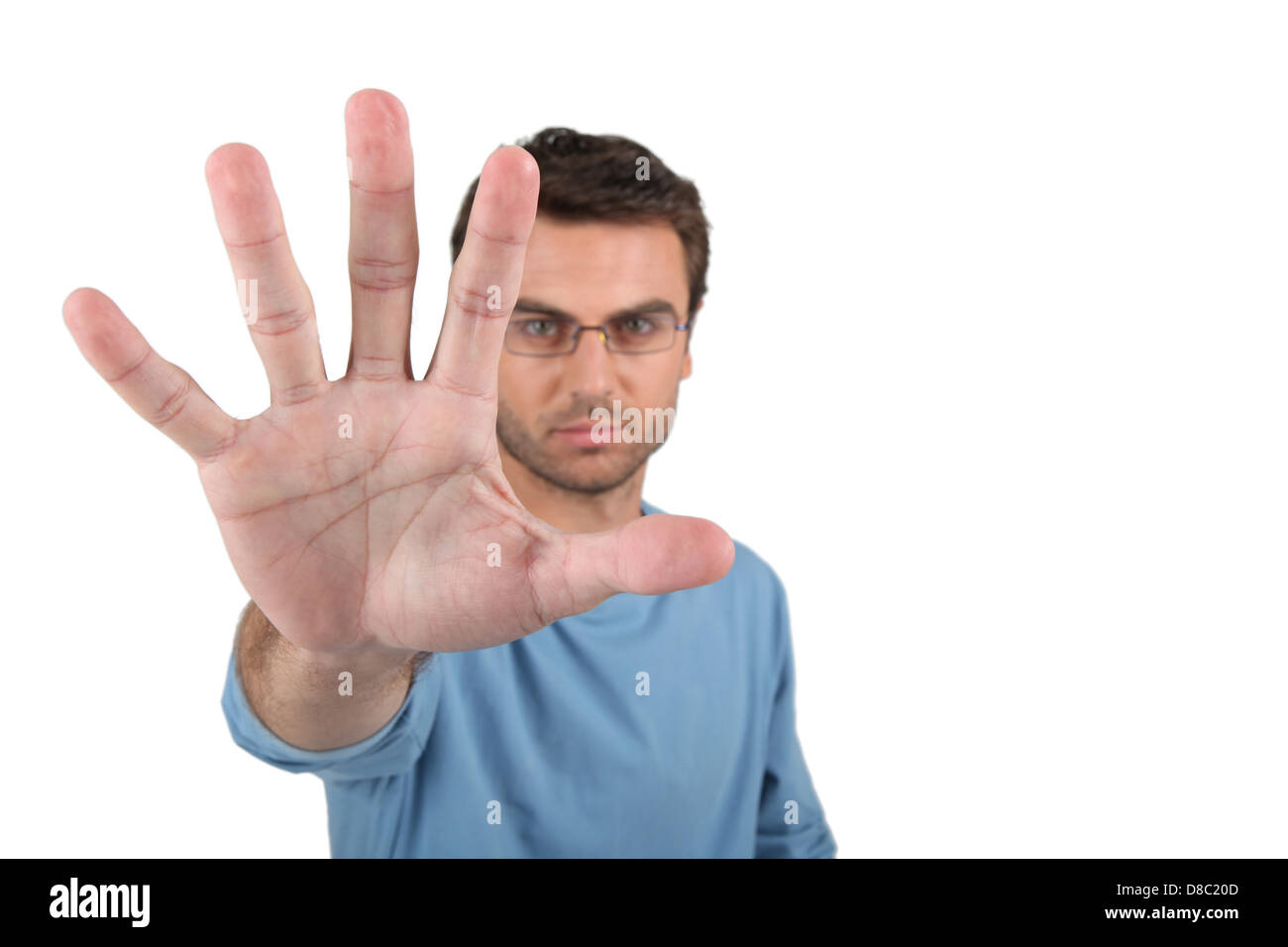 Man wearing glasses with arm stretched Stock Photo Alamy