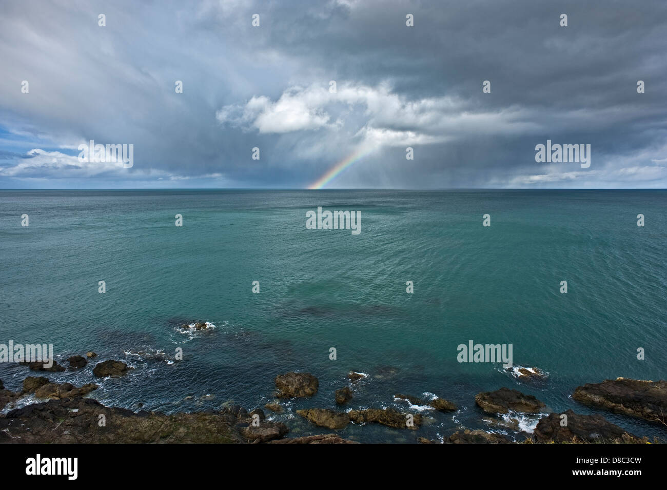Rainbow over Irish Sea, viewed from Blackhead, County Antrim, Northern Ireland. Stock Photo