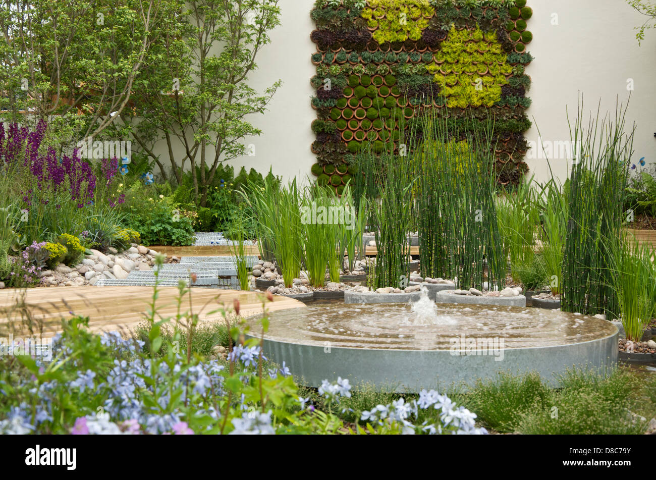 The fountain and living wall in the RBC Blue Water Roof Garden at RHS Chelsea Flower Show 2013, London, UK Stock Photo