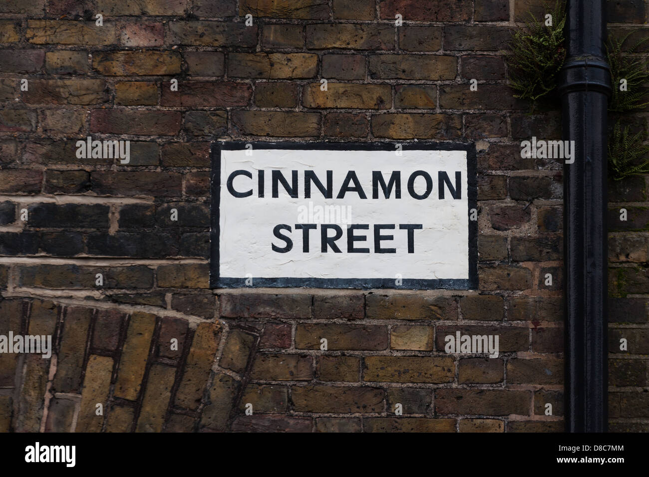 Old street sign on brick wall in Wapping, east London. Stock Photo