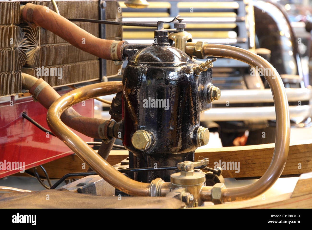 Engine with pipes and radiator on a very old car Stock Photo Alamy