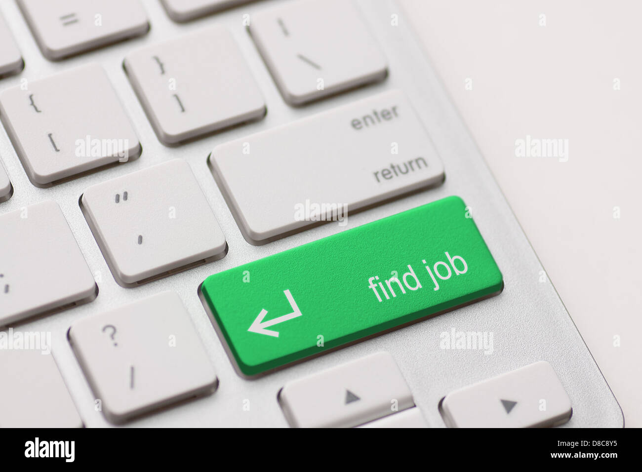 find job enter button key on white keyboard Stock Photo