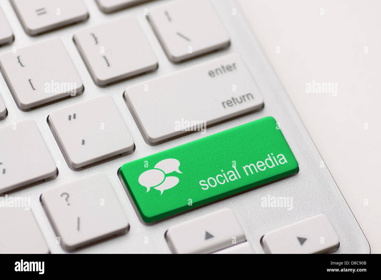 Social Media button on a keyboard with speech bubbles. Stock Photo