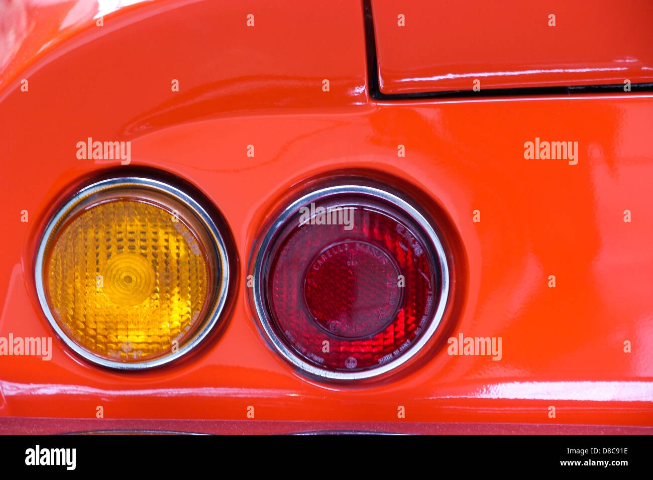 Back lights on an old ferrari red car. Stock Photo