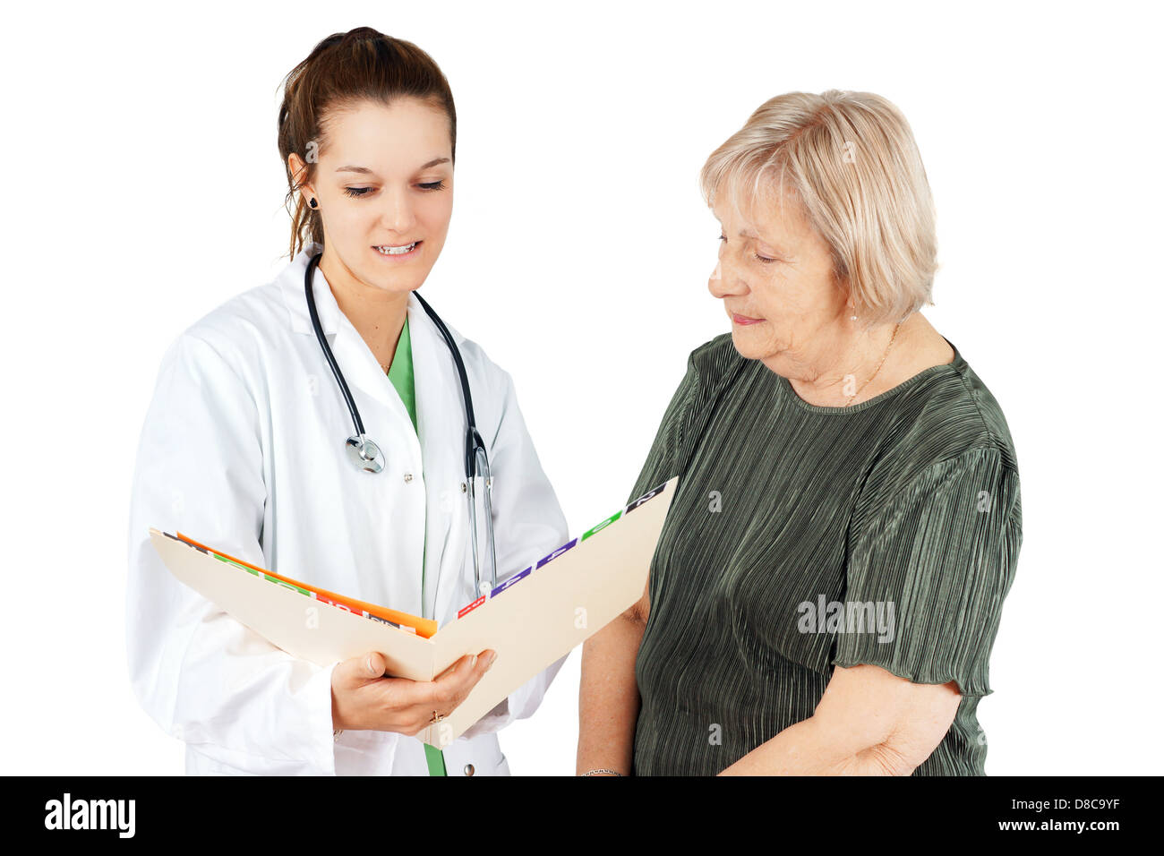 Young female doctor explaining test results to her senior woman patient Stock Photo