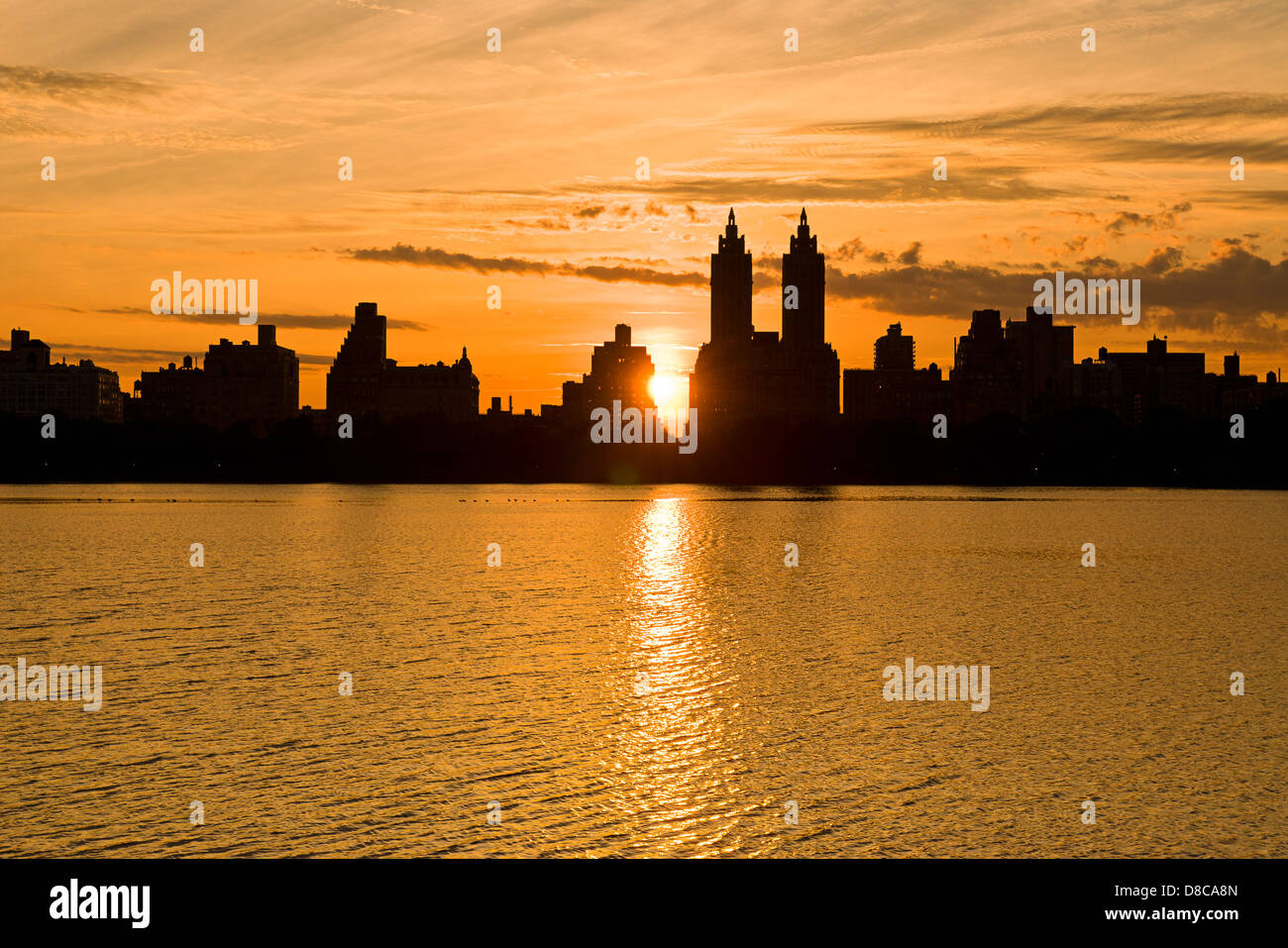 Silhouette of Central Park West skyline and El Dorado Apartment Building, the reservoir, Central Park, Manhattan, New York City. Stock Photo