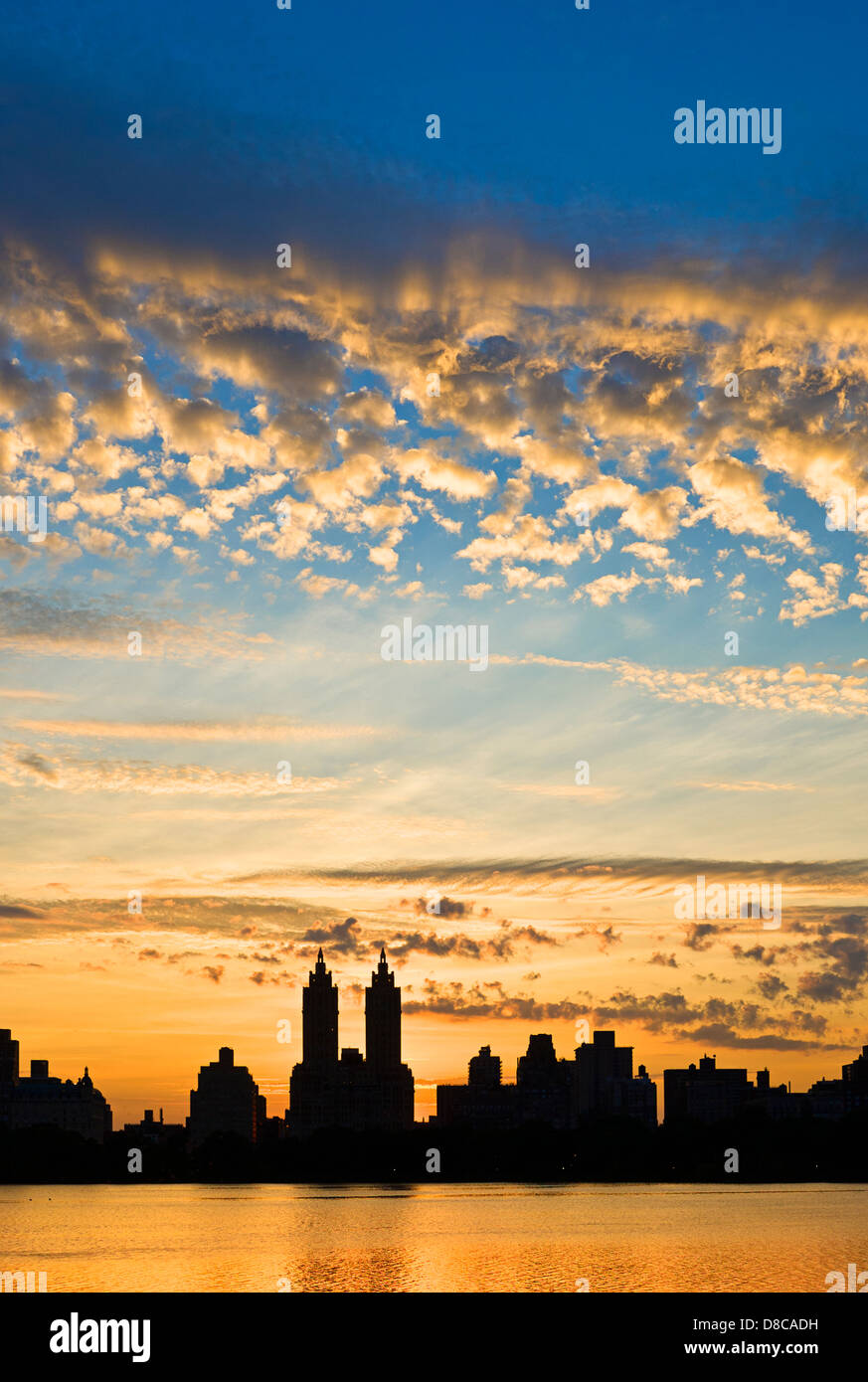 Silhouette of Central Park West skyline and El Dorado Apartment Building, the reservoir, Central Park, Manhattan, New York City. Stock Photo