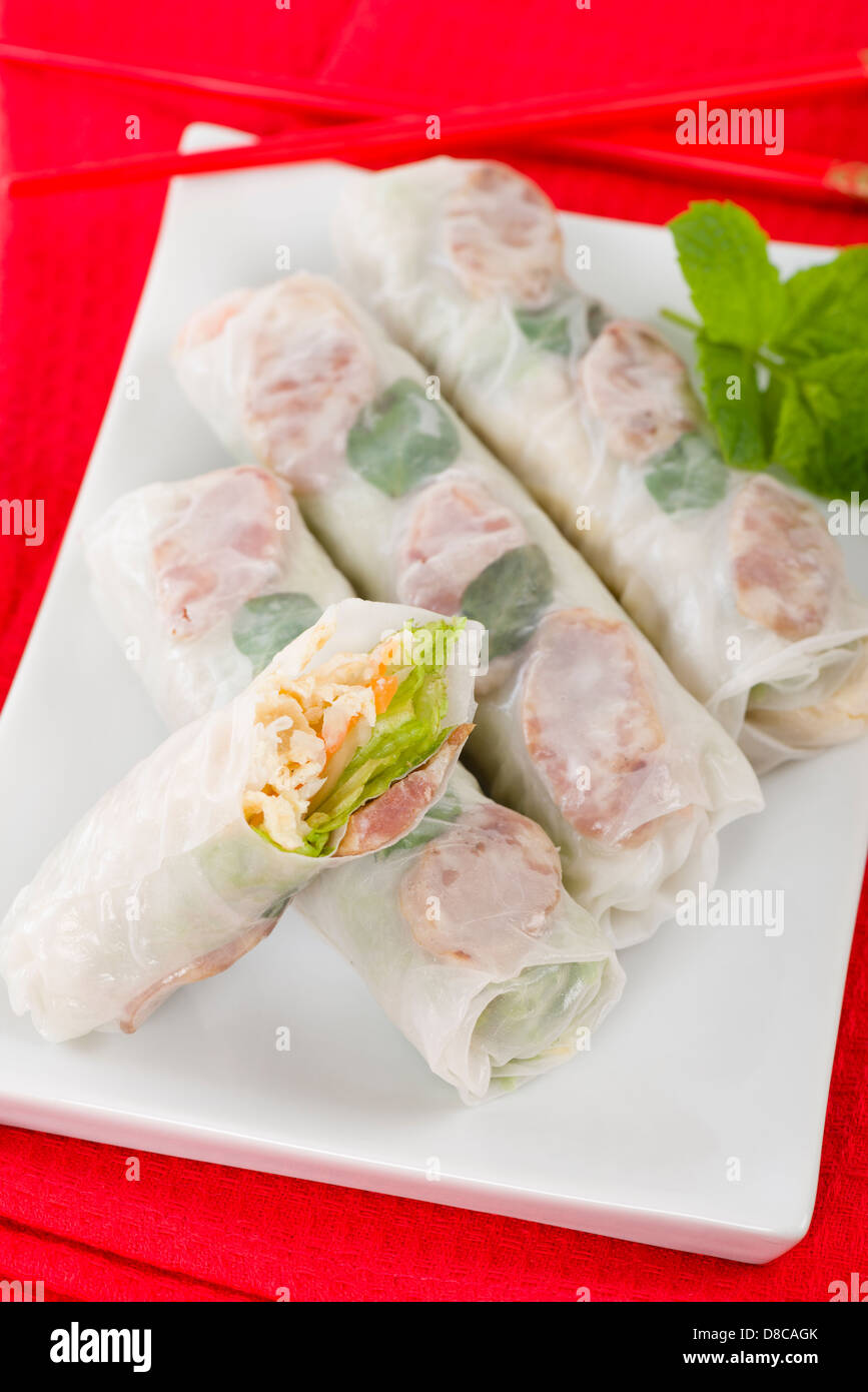 Bo Bia - Vietnamese fresh summer rolls with Chinese sausage, jicama, carrots, lettuce, egg and dried shrimp. Stock Photo