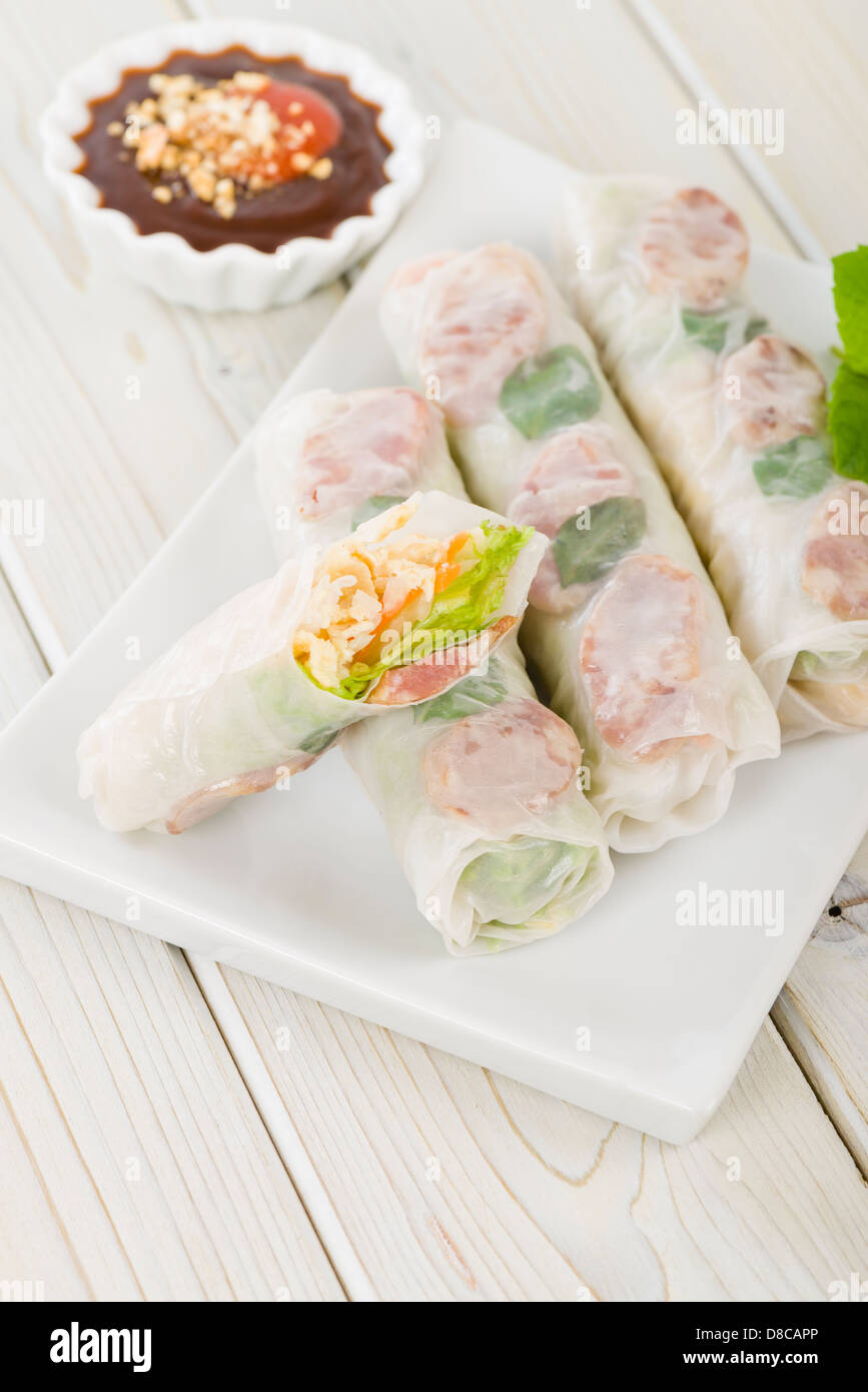 Bo Bia - Vietnamese fresh summer rolls with Chinese sausage, jicama,  carrots, lettuce, egg and dried shrimp Stock Photo - Alamy