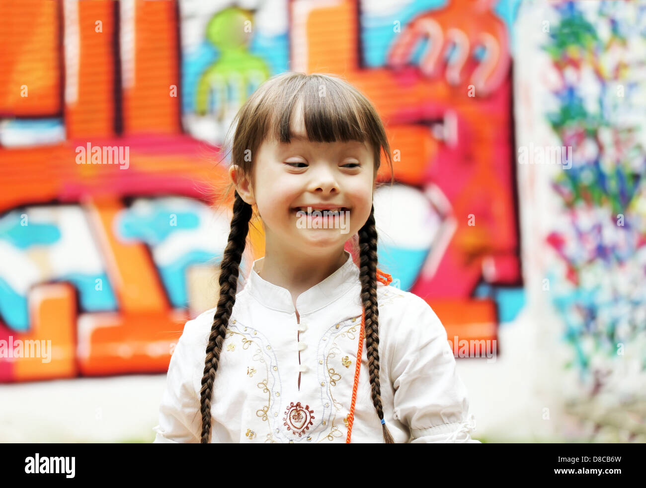 Portrait of beautiful young girl on the playground Stock Photo - Alamy