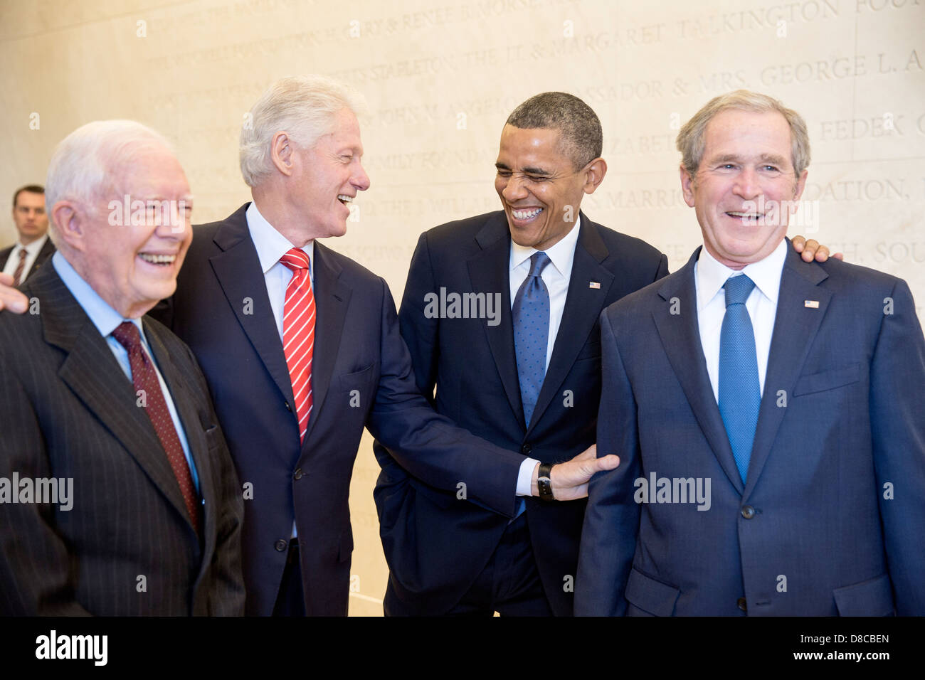 US President Barack Obama laughs with former Presidents Jimmy Carter, Bill Clinton, and George W. Bush, prior to the dedication of the George W. Bush Presidential Library and Museum on the campus of Southern Methodist University April 25, 2013 in Dallas, Texas. Stock Photo