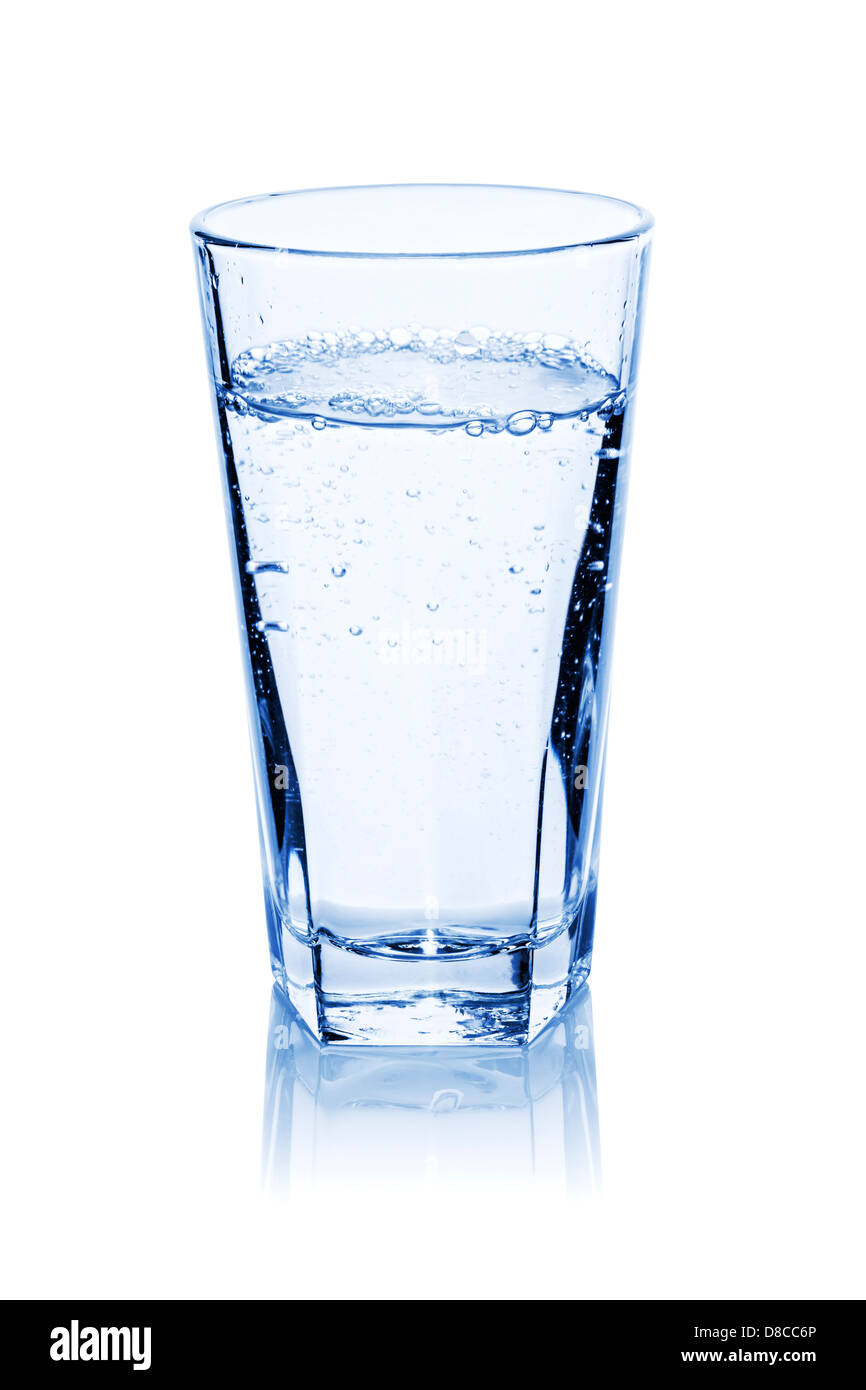 Glass of water, freshly poured with bubbles, isolated on white, clipping path provided, blue tone. Stock Photo