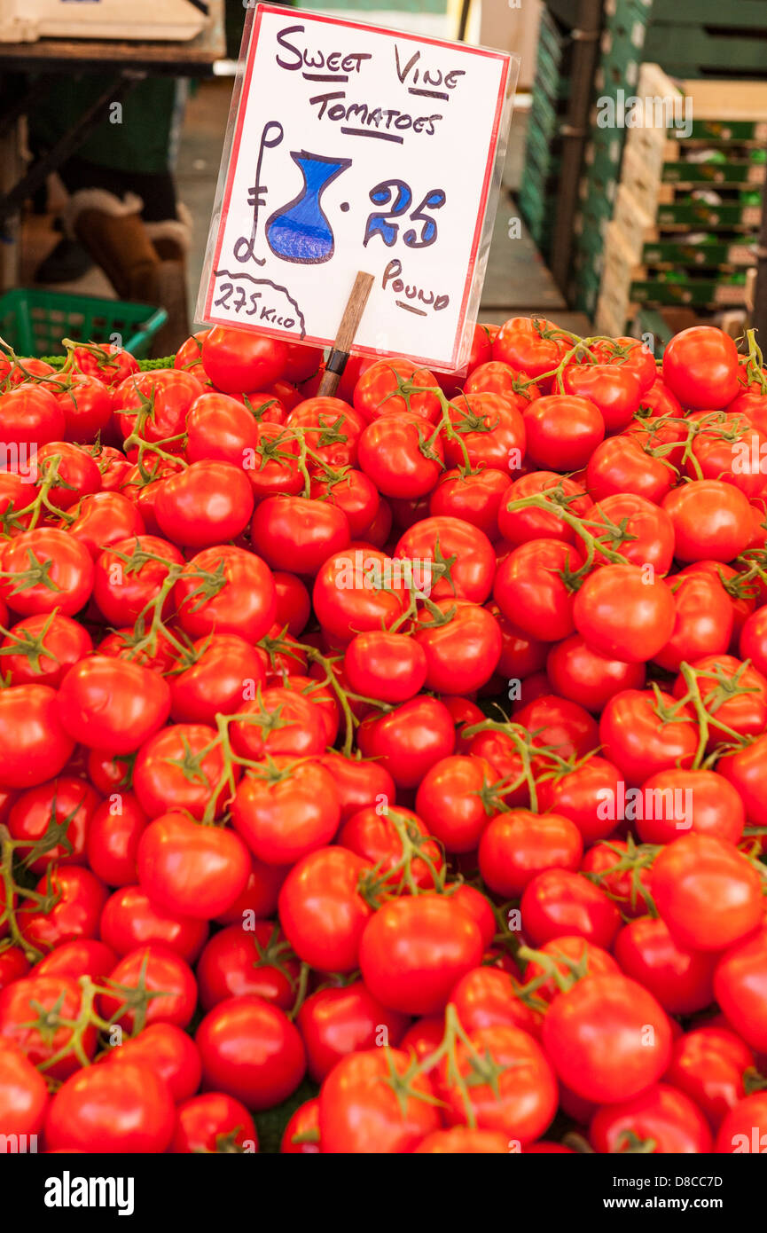 Sweet vine tomatoes for sale on the market in Cambridge, England, Britain, Uk Stock Photo