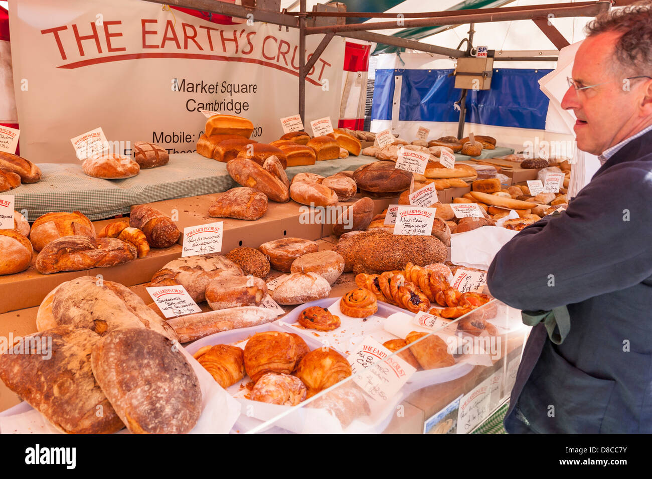 The Earth's Crust bakery with bread for sale on the market in Cambridge, England, Britain, Uk Stock Photo