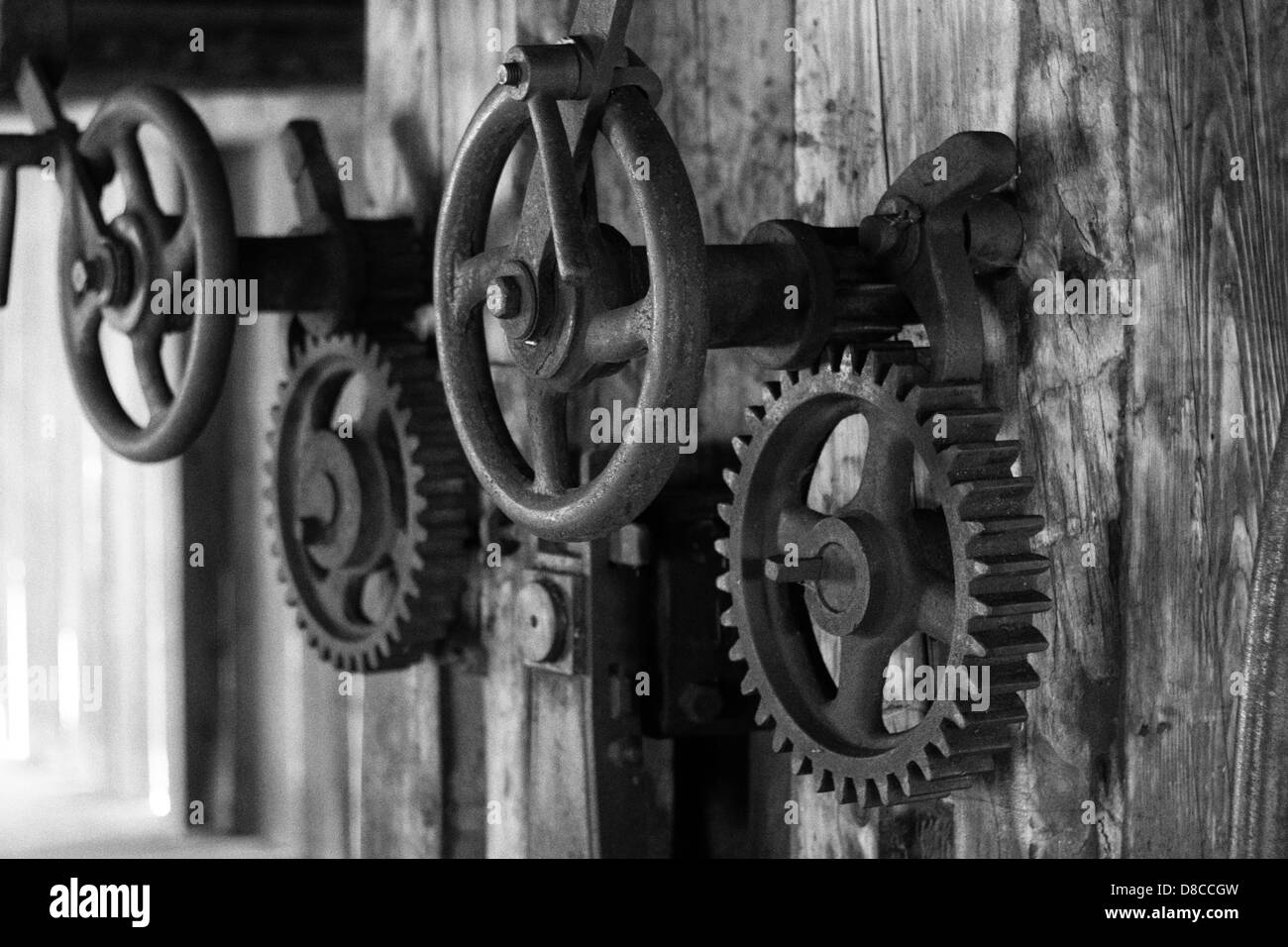 Gears in the old sawmill Stock Photo