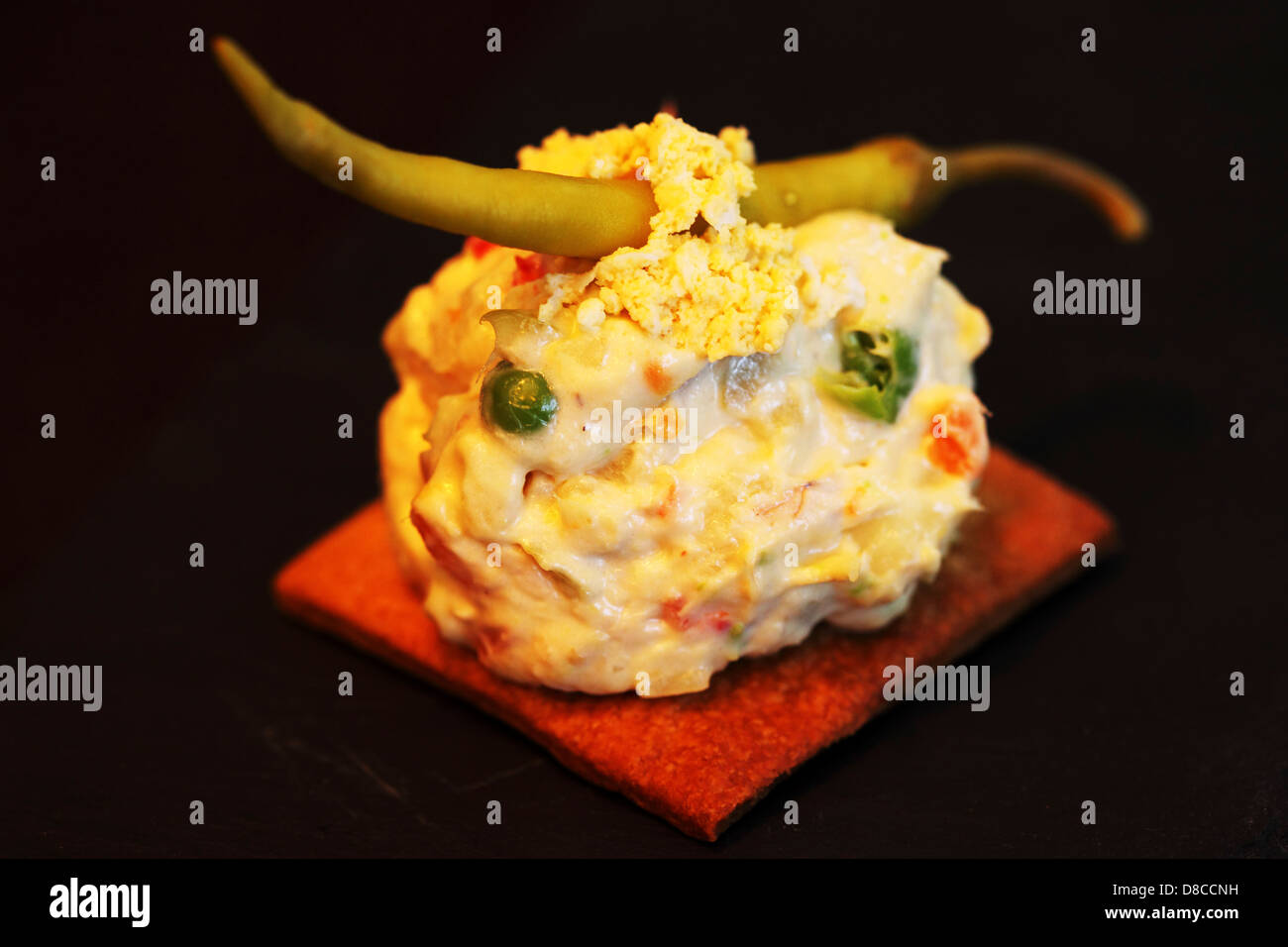 A Pincho (bite sized Tapas served on freshly cooked bread) is served at Ibérica La Terraza in London. Stock Photo