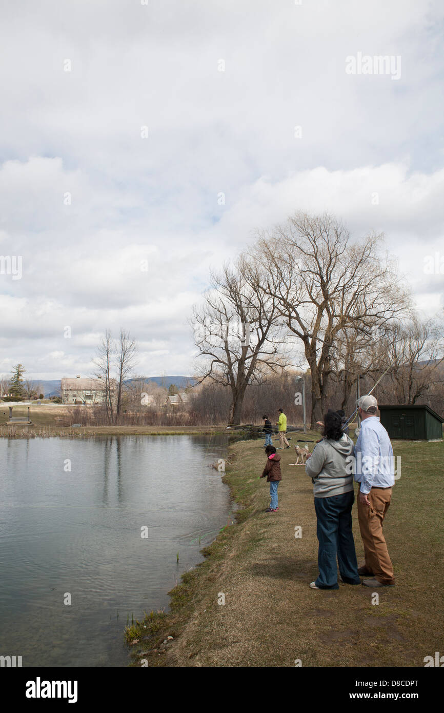 A woman and her daughter are taking fly fishing lessons at the Orvis