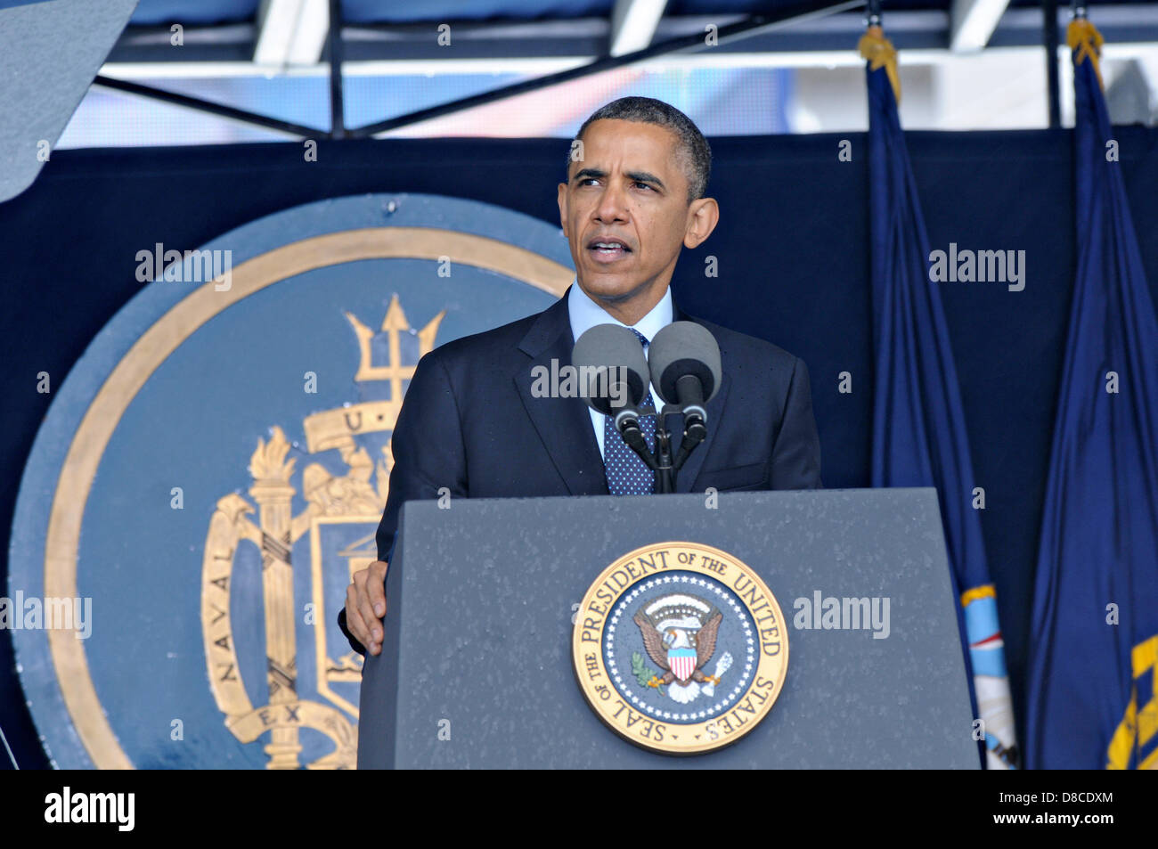 US President Barack Obama gives the commencement address at the US Naval Academy graduation and commissioning ceremony May 24, 2013 in Annapolis, MD. The academy graduated 841 ensigns and 206 Marine Corps 2nd lieutenants at Navy-Marine Corps Memorial Stadium. Stock Photo