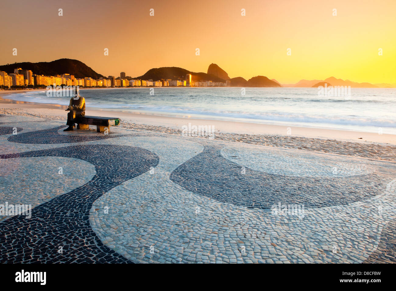 Brazilian poet Carlos Drummond de Andrade statue at Copacabana beach sidewalk, Rio de Janeiro, Brazil. Stock Photo