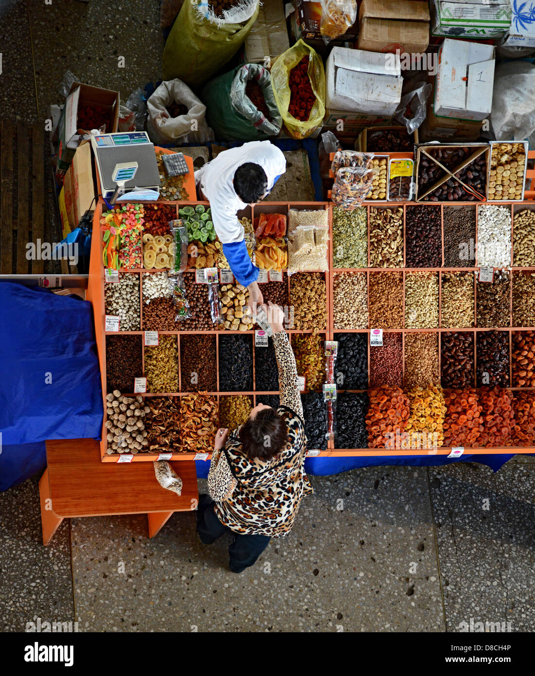 Nuts seller amd customer from above. Noviy Rynok (New Market) in
