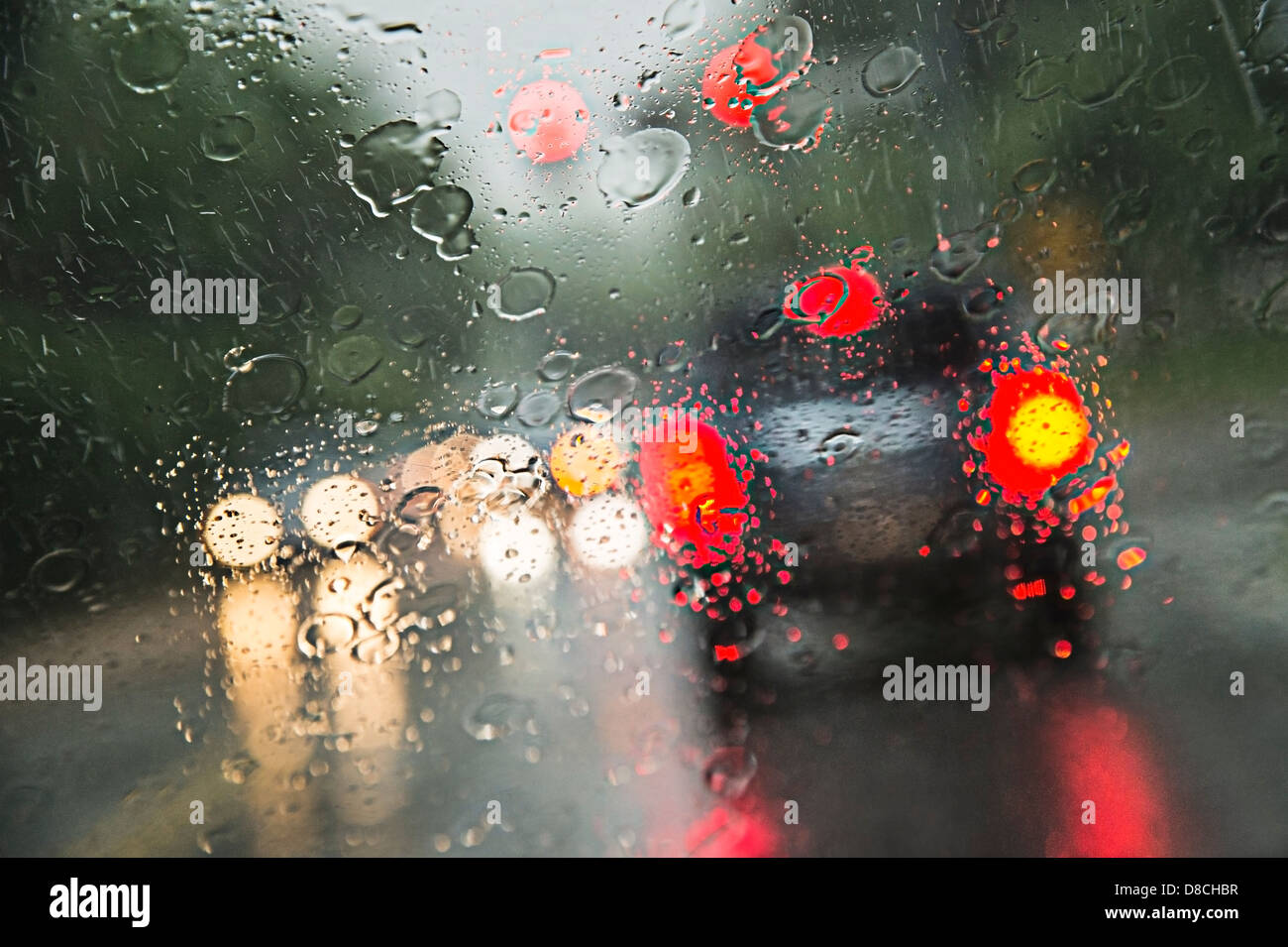 Rain On Windshield With Cars Driving In Rain Storm Stock Photo Alamy
