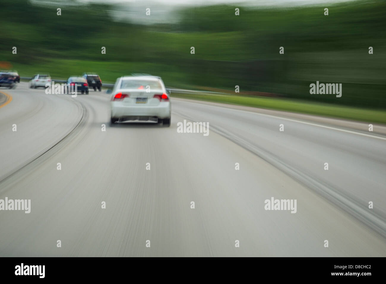 Cars On Highway During The Day With Motion Blur Stock Photo