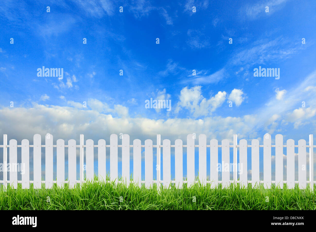 white fence and blue sky Stock Photo