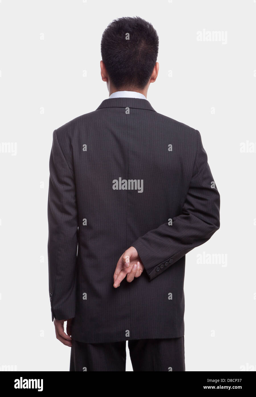 Fingers crossed behind back suit hires stock photography and images