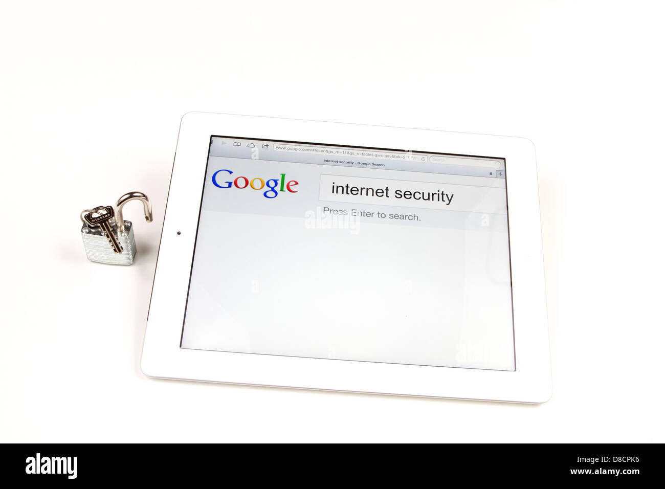White ipad showing a google search for security on a white background with a open