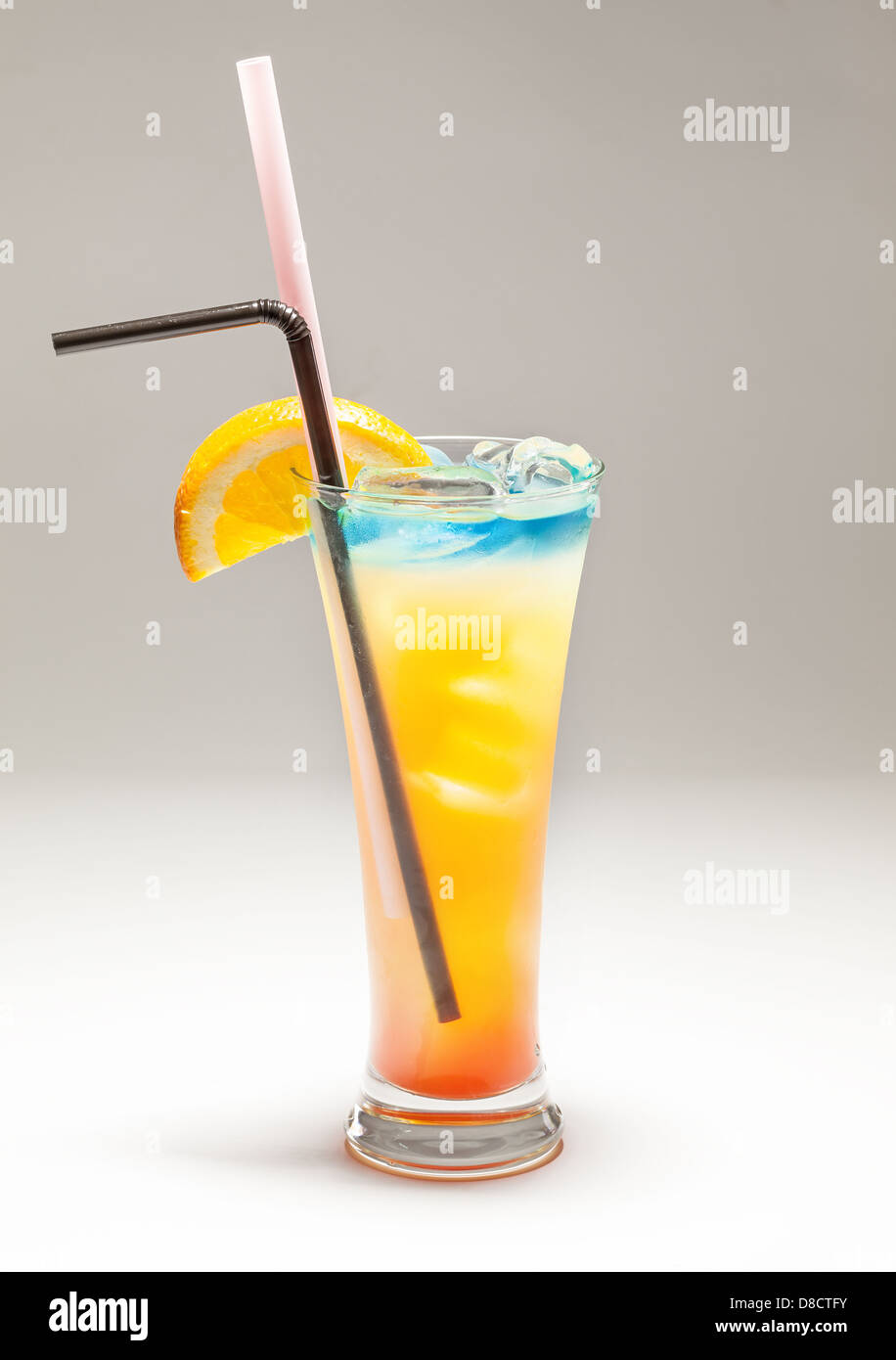 Cocktail of juice and alcohol drink, colorful refreshment drink, studio