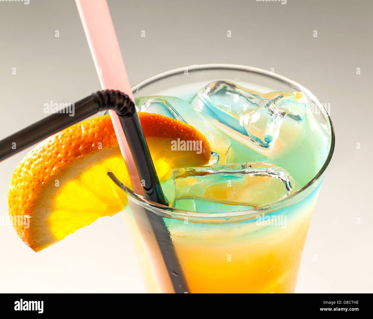 Cocktail of juice and alcohol drink, colorful refreshment drink, studio